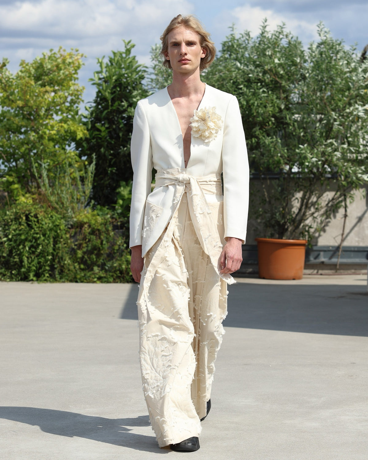 Pleated Pants on the runway, ESCAPIST GARDEN SS27. Photograph: Boris Marberg for Berlin Fashion Week.